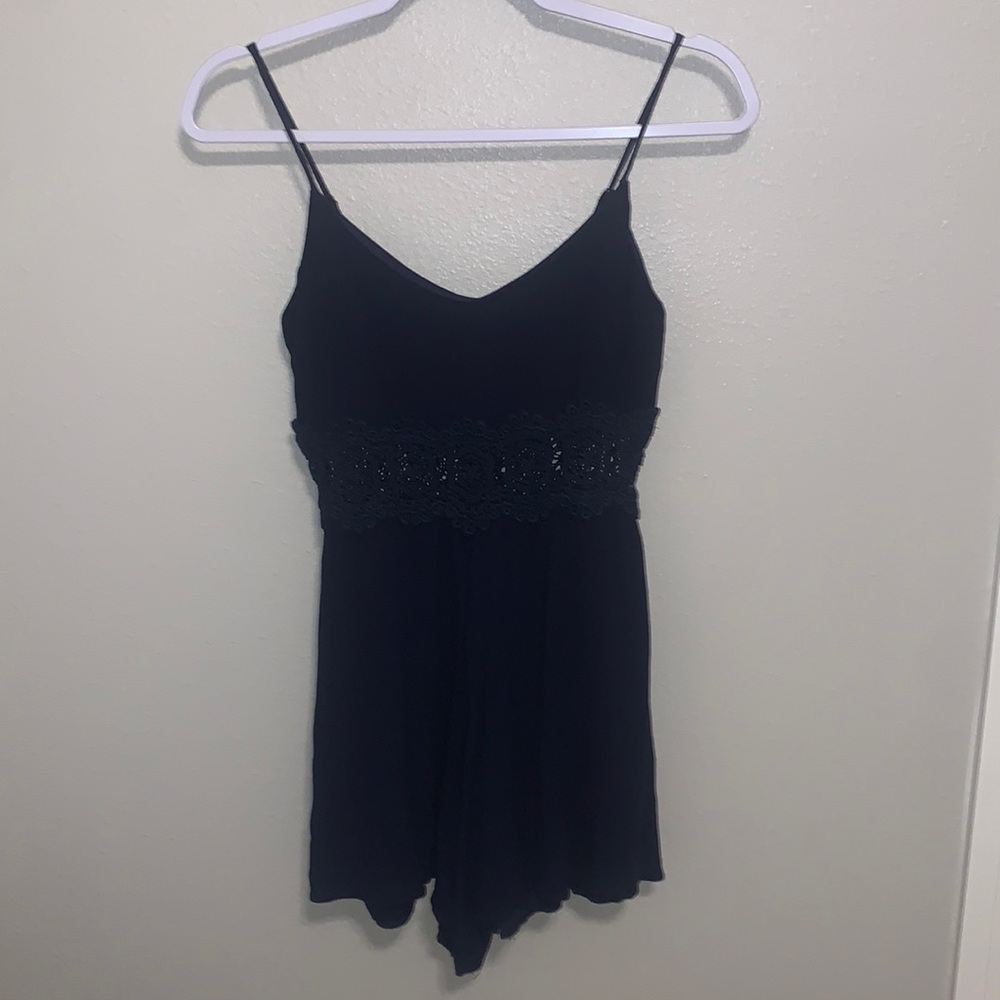 I am selling a navy blue romper! This style is very fun!